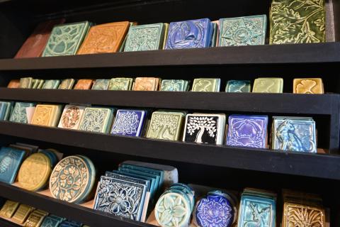Shelves of Pewabic Pottery tiles.